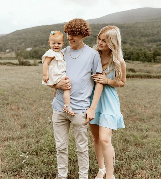 brooke morton with her boyfriend and their daughter